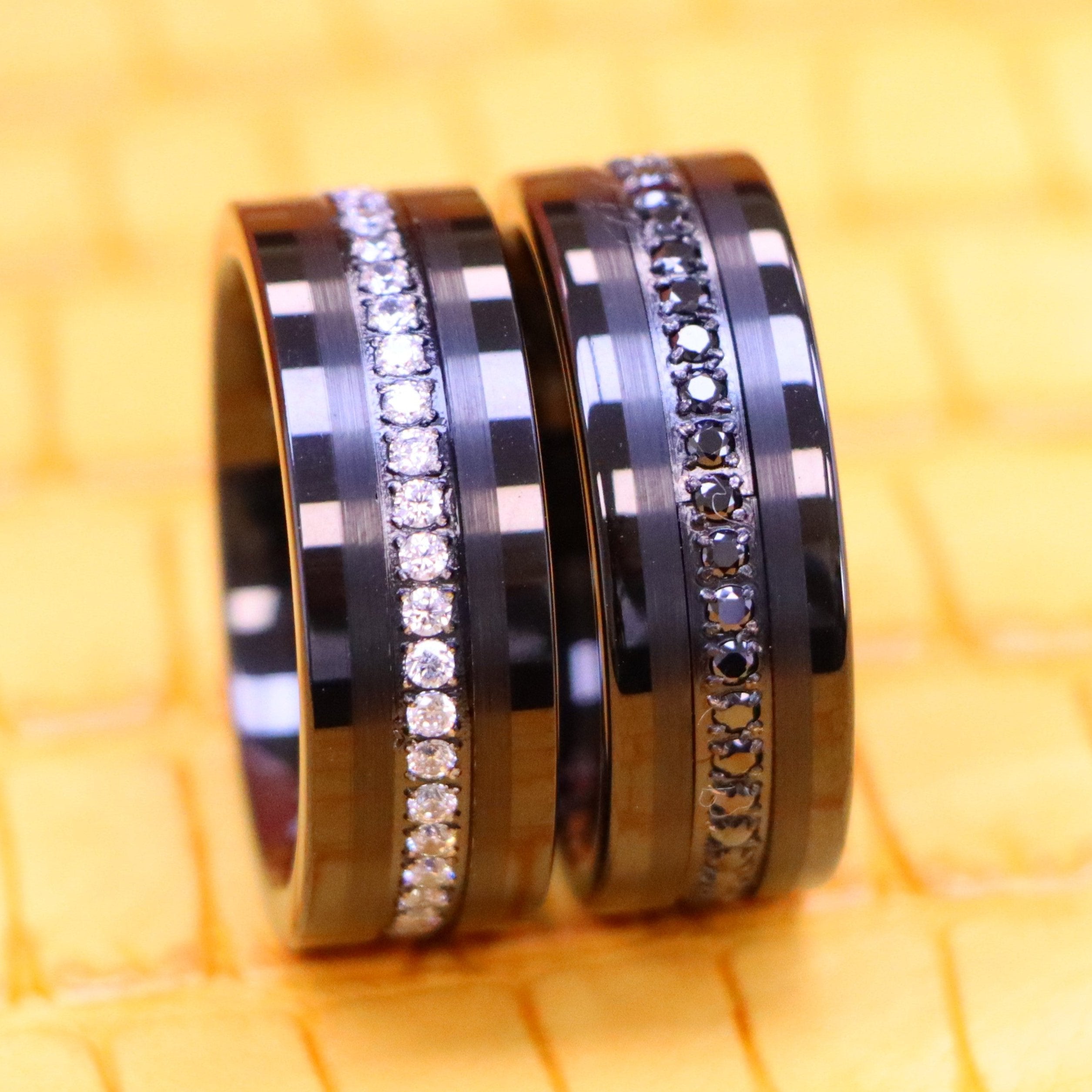 8mm Black IP Plated Prong-set Round-cut White CZ Eternity ring and 8mm Black IP Plated Prong-set Round-cut Black CZ Eternity Tungsten Ring for men and women - clear front view