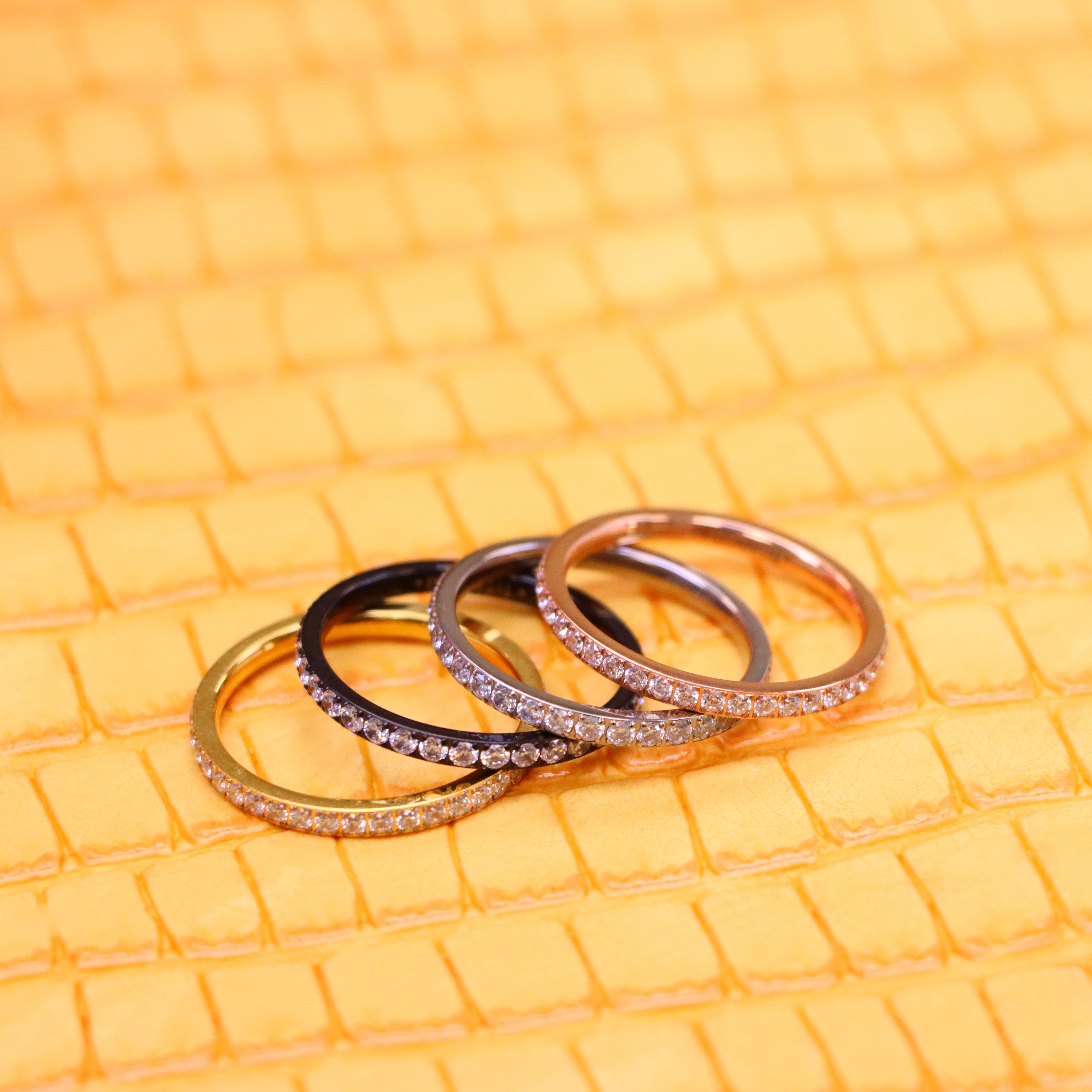 2mm Titanium Black/Silver/Yellow Gold/Rose Gold Full Eternity CZ Ring in a one on one spreaded left side view - Men's Titanium Jewelry