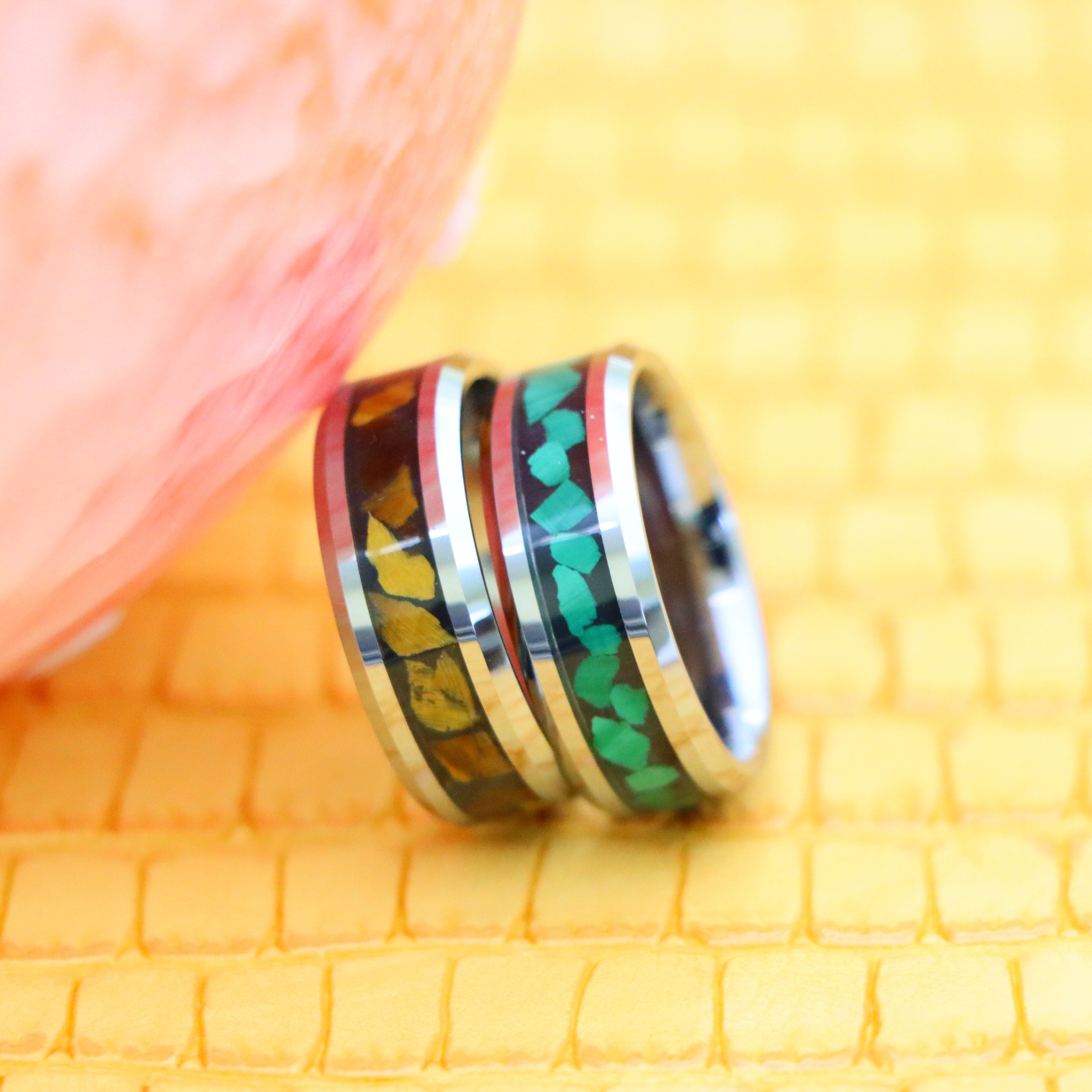 8mm Beveled Edge with Malachite Chips essence of joy tungsten ring and 8mm Beveled Edge with Tiger Eye Chips Tungsten Ring for protection for men and women seeking for joy and good luck - one on one falling front view
