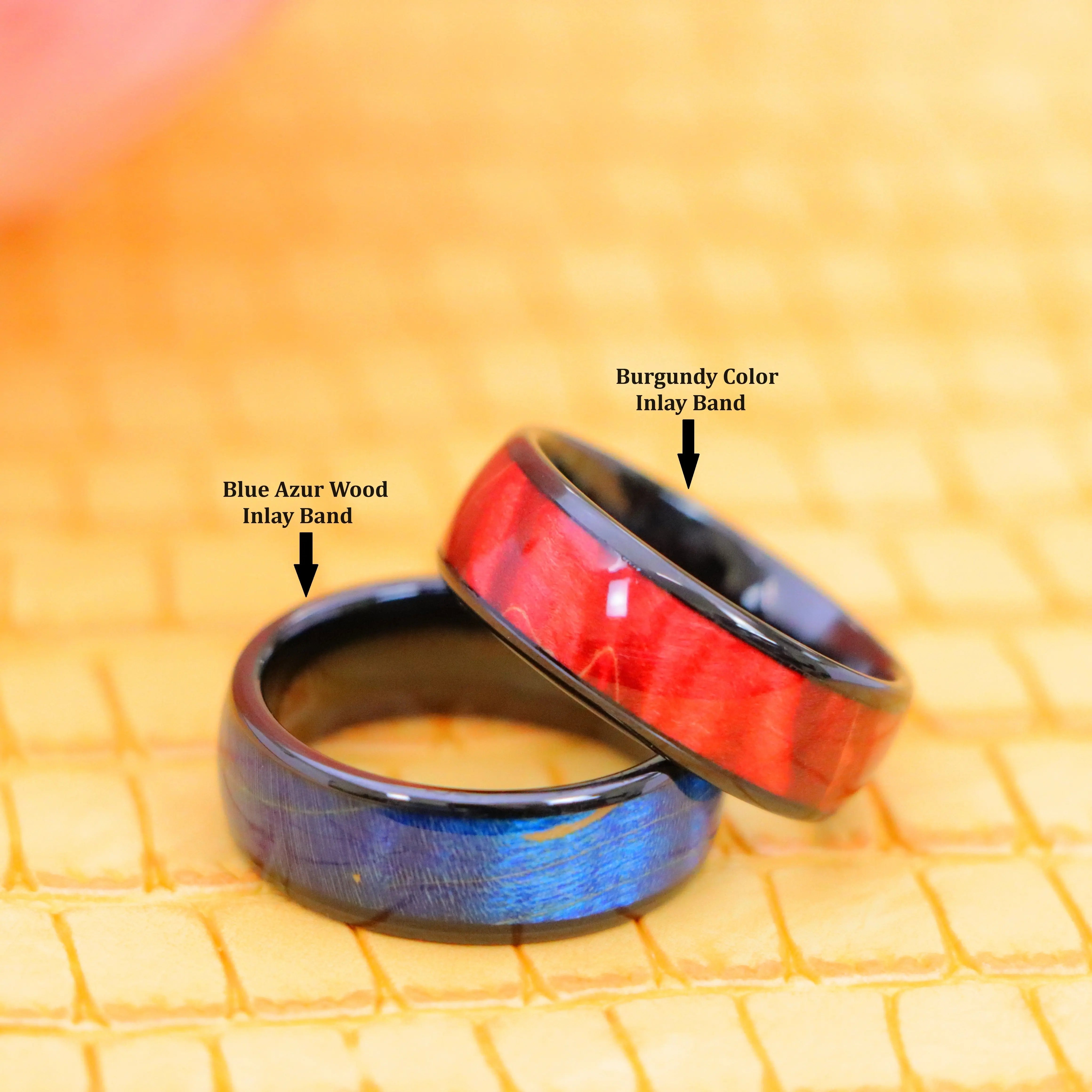8mm Black IP Domed Azure Stain Stabilized Wood inlay men's tungsten band and 8mm Red Burgundy Hue Solidified Wood Inlay men's Tungsten Ring for Men's Regular wear - one on one spreaded view with tags
