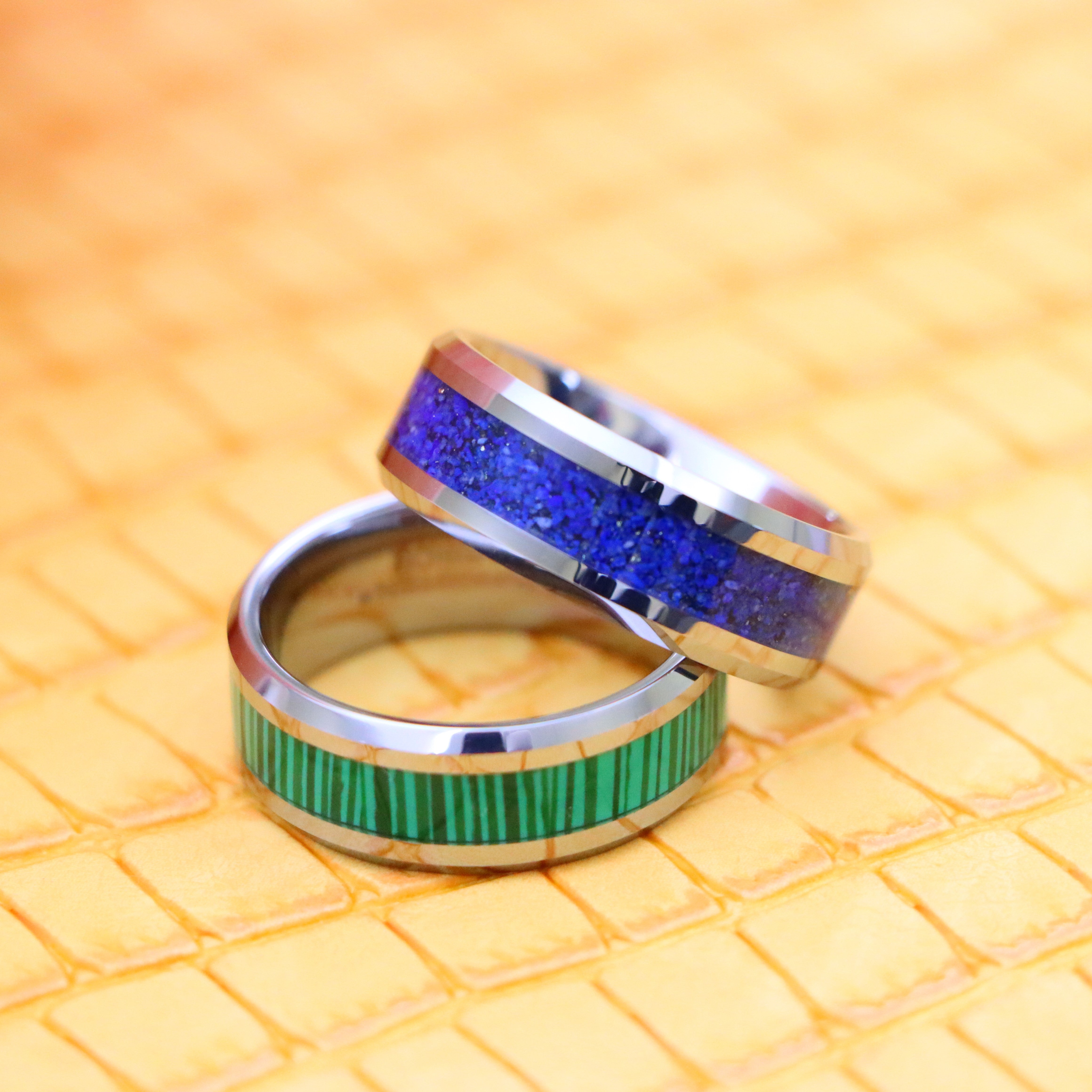 8mm Beveled Edge with Lapis Lazuli good luck tungsten ring and 8mm Beveled Edge with Malachite Strips essence of joy Tungsten Ring - one on one spreaded zoom in view