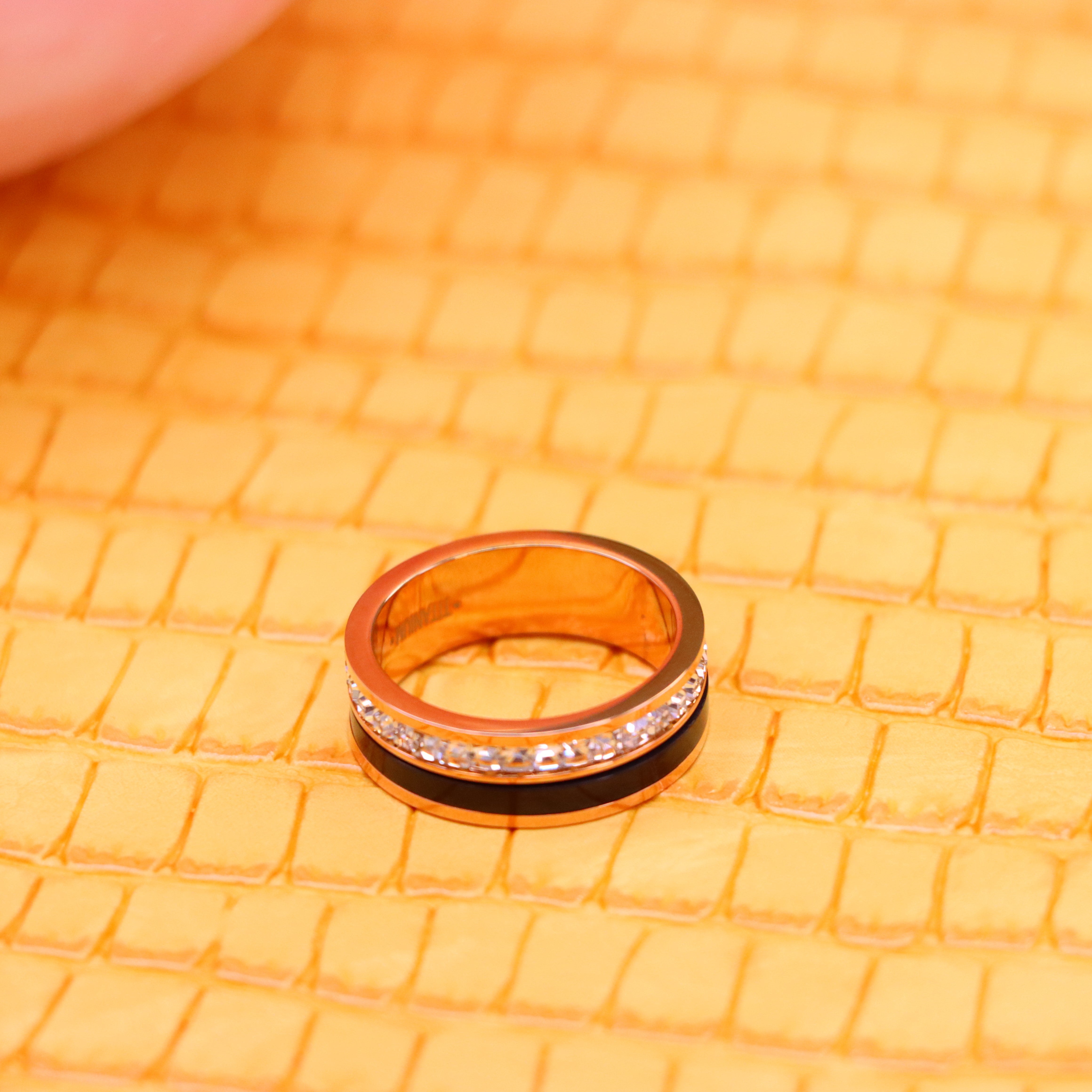 7mm Rose Gold Black IP Plated Titanium Spinner Princess cut Eternity CZ Titanium Ring side view - Rose Gold ring for women and men