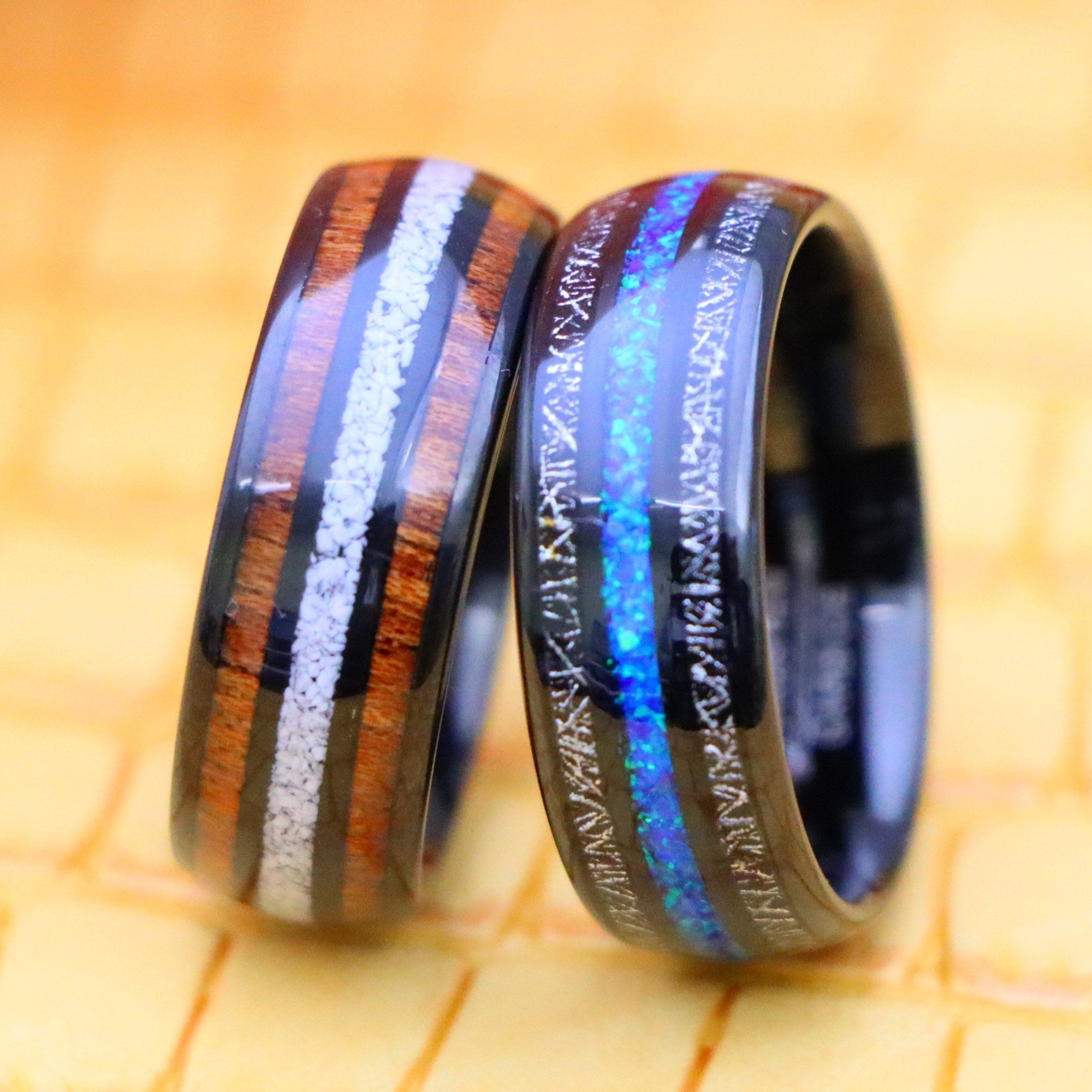 8mm Black IP Plated Koa & Crushed White Turquoise Inlay tungsten ring for pure and wise people and 8mm Black IP Plated Titanium Scraps & fake Opal Inlay Tungsten Ring - clear front view image