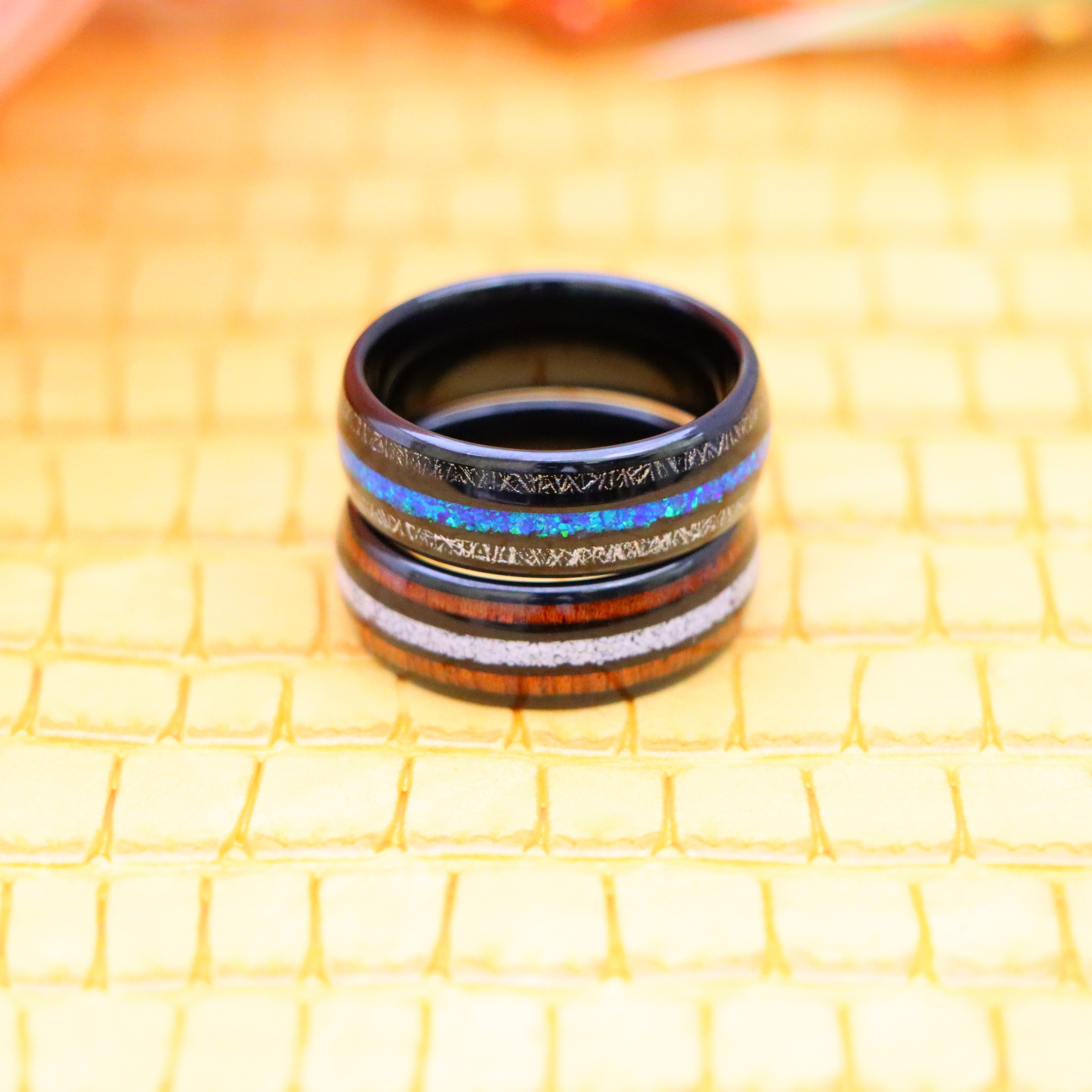 8mm Black IP Plated Titanium Scraps & fake Opal Inlay Tungsten Ring on 8mm Black IP Plated Koa & Crushed White Turquoise Inlay tungsten ring for pure and wise people - one on one view