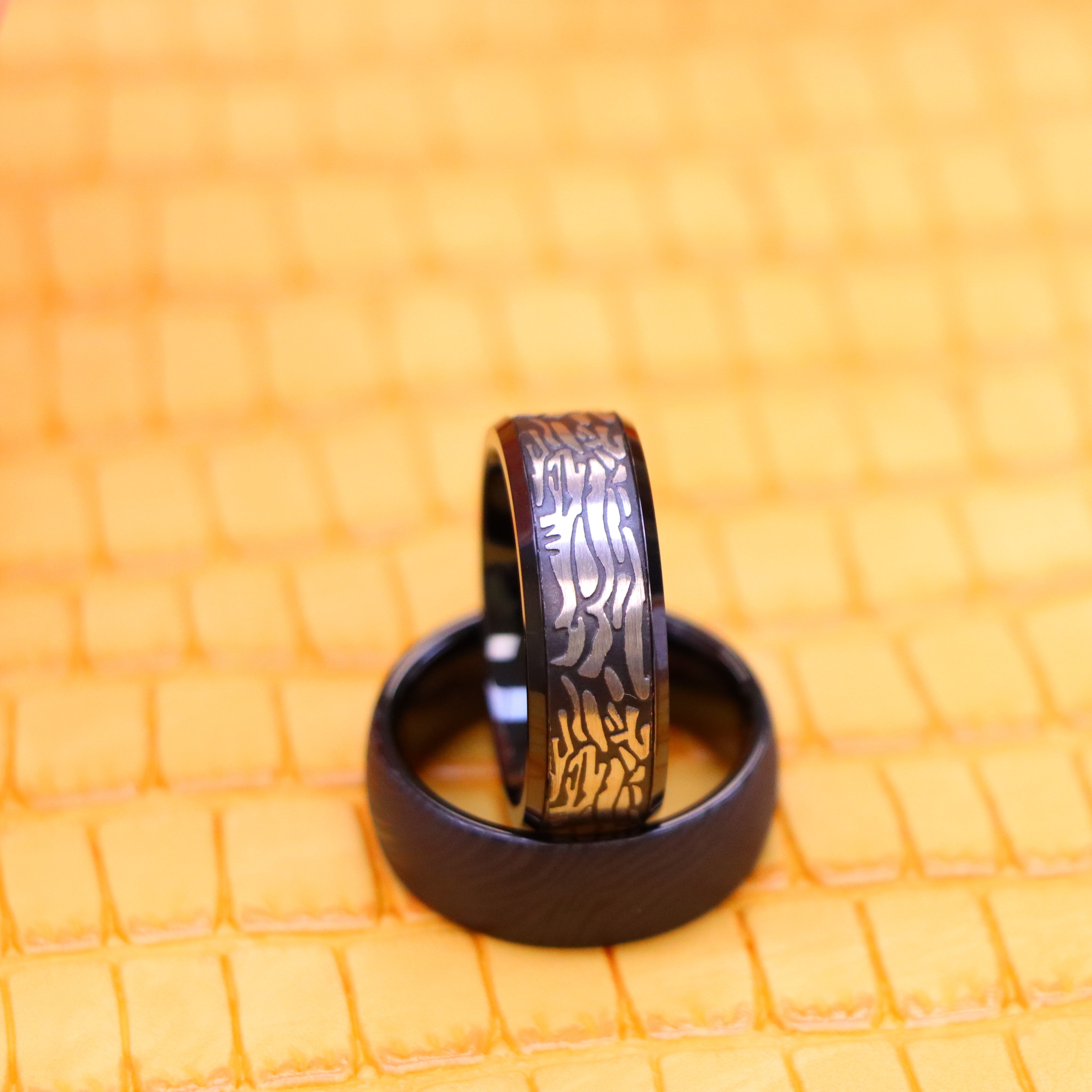 8mm Black IP Plated Semi-Dome Laser Carved Mokume Gane Effect (wood grain effect) Tungsten Ring and 8mm Black IP Plated Laser Carved Rock Art Pattern Tungsten Ring for bold men and women - Prodct image view