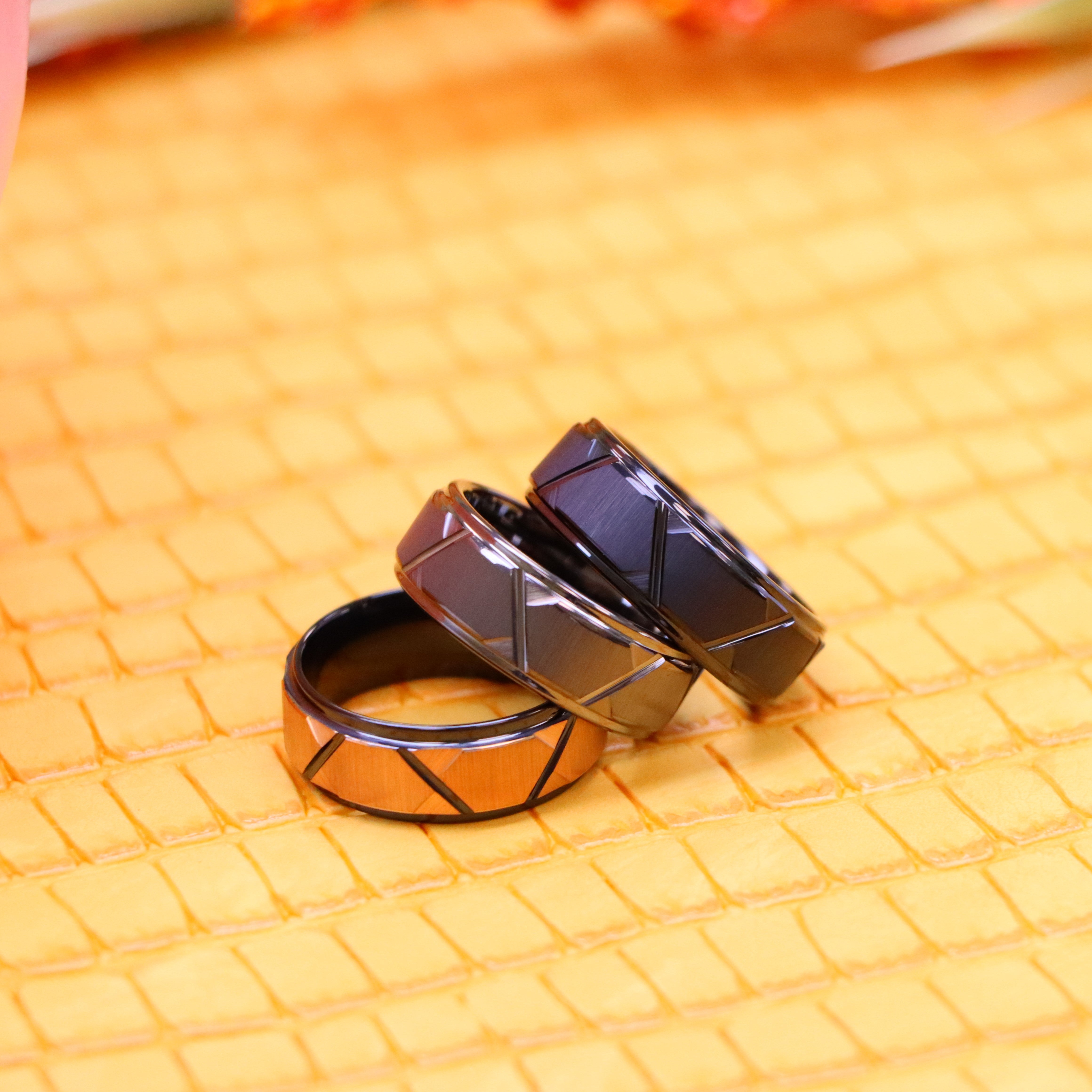8mm black brushed Rose gold Plated Trapezoid Center, Grooves & Stepped Edge Tungsten Ring, 8mm black brushed black Gun Metal Plated Trapezoid Center, Grooves & Stepped Edge Tungsten Ring, 8mm grey brushed Gun Metal Plated Trapezoid Center, Grooves & Stepped Edge Tungsten Ring - one on one spreaded view