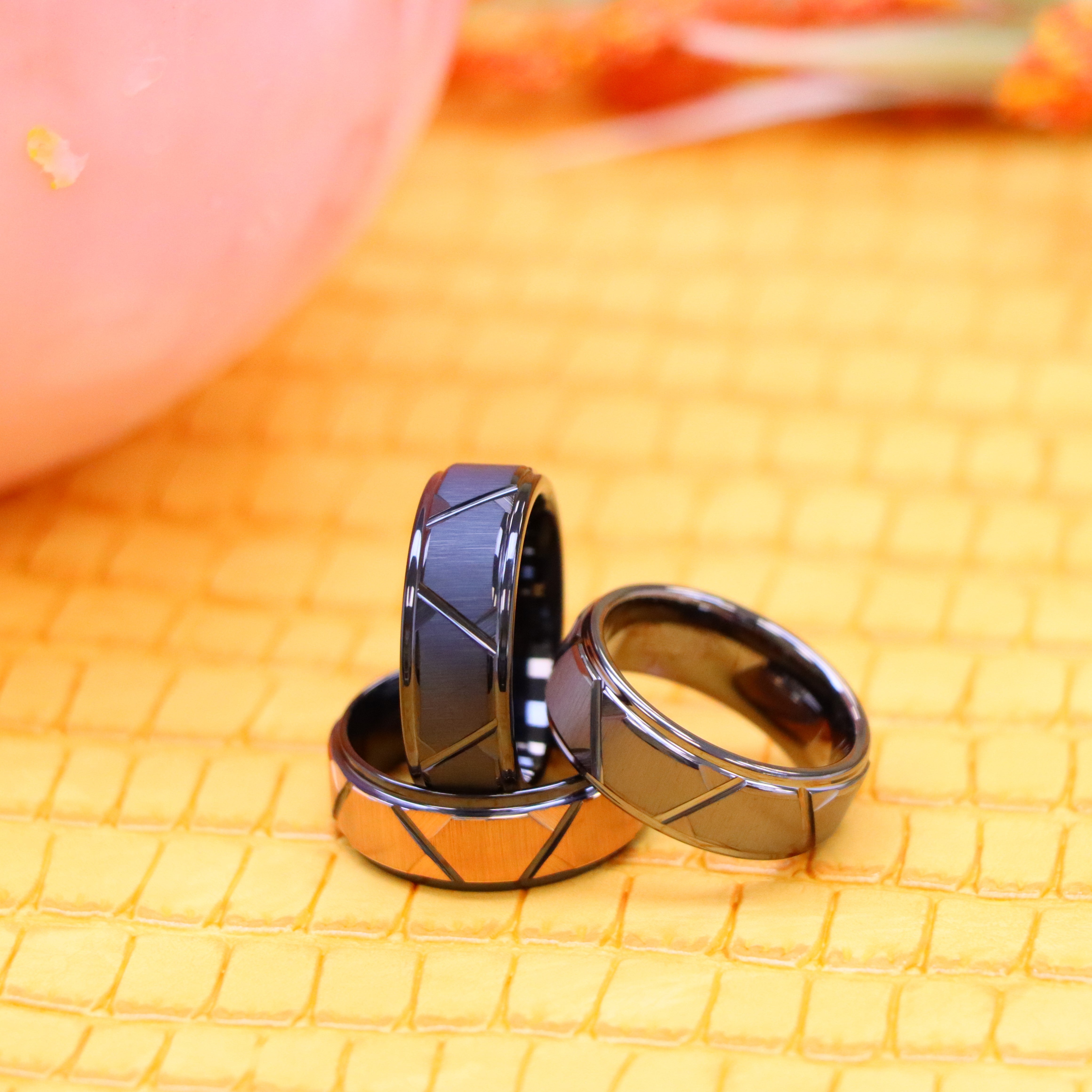 8mm black brushed Rose gold Plated Trapezoid Center, Grooves & Stepped Edge Tungsten Ring on 8mm black brushed black Gun Metal Plated Trapezoid Center, Grooves & Stepped Edge Tungsten Ring besides 8mm grey brushed Gun Metal Plated Trapezoid Center, Grooves & Stepped Edge Tungsten Ring - product view