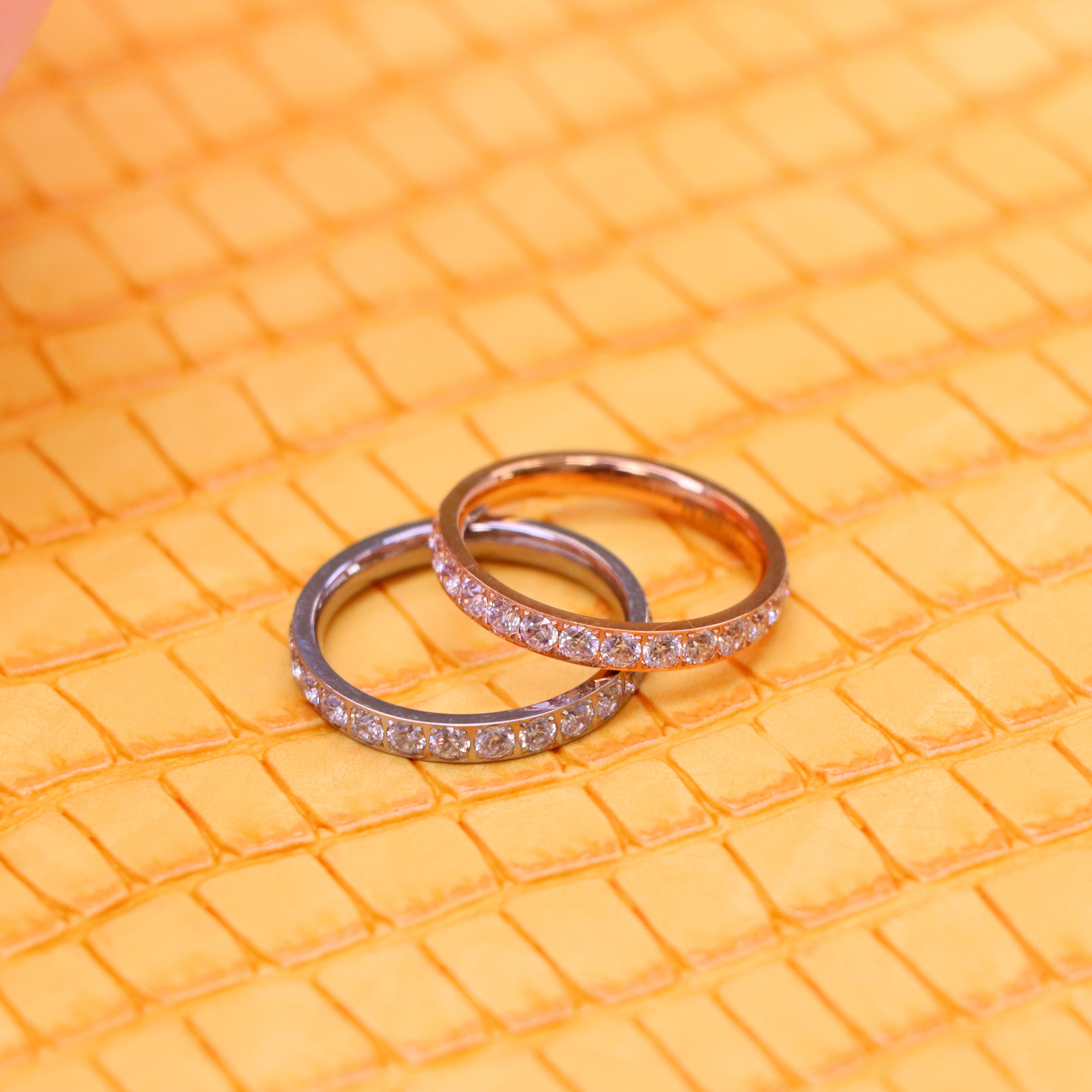3mm White and Rose Gold Full Eternity White CZ Titanium Ring one on one spreaded view