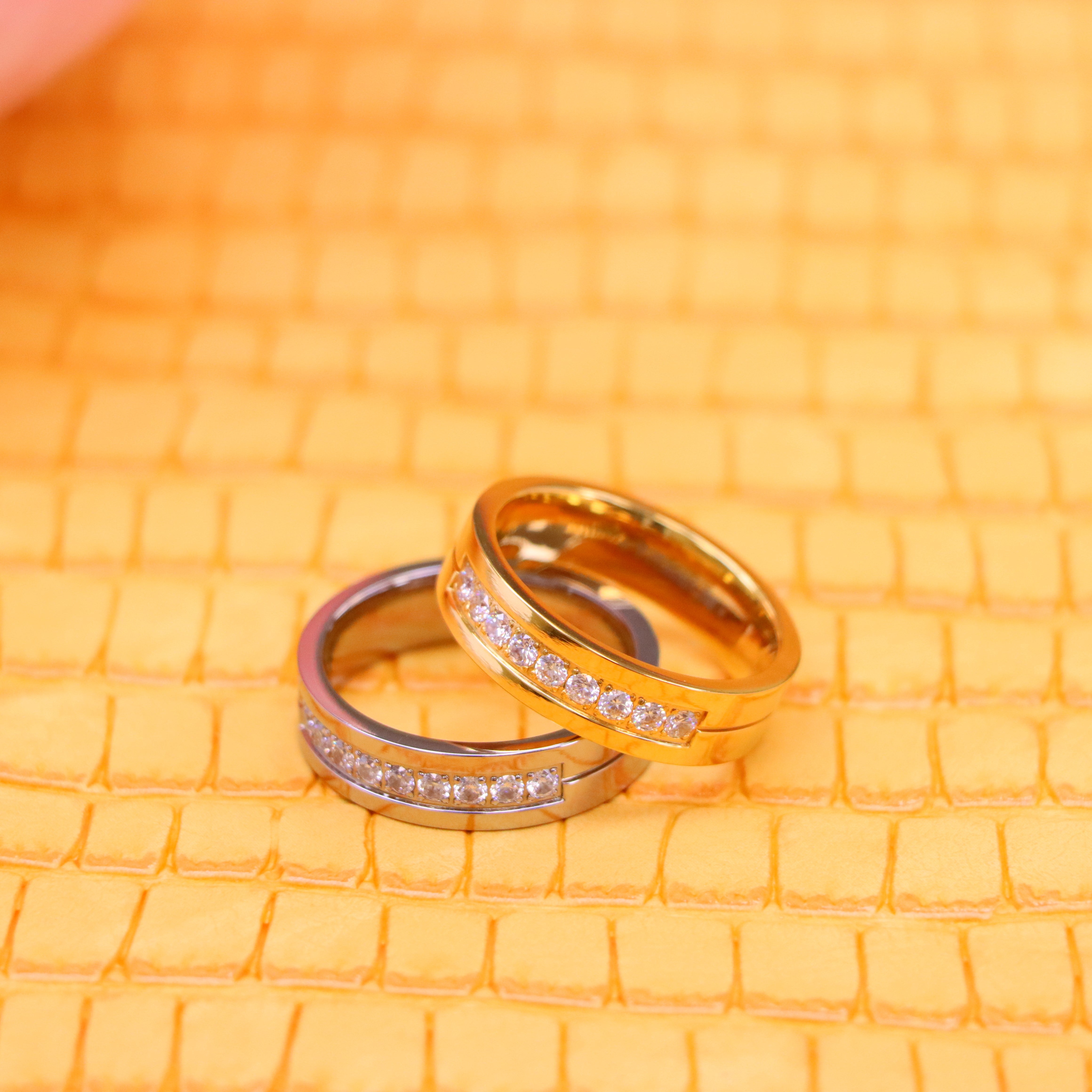 6mm Titanium and yellow Black Rings with 9white CZ Stones - Men's Titanium Jewelry in a one on one half stack view