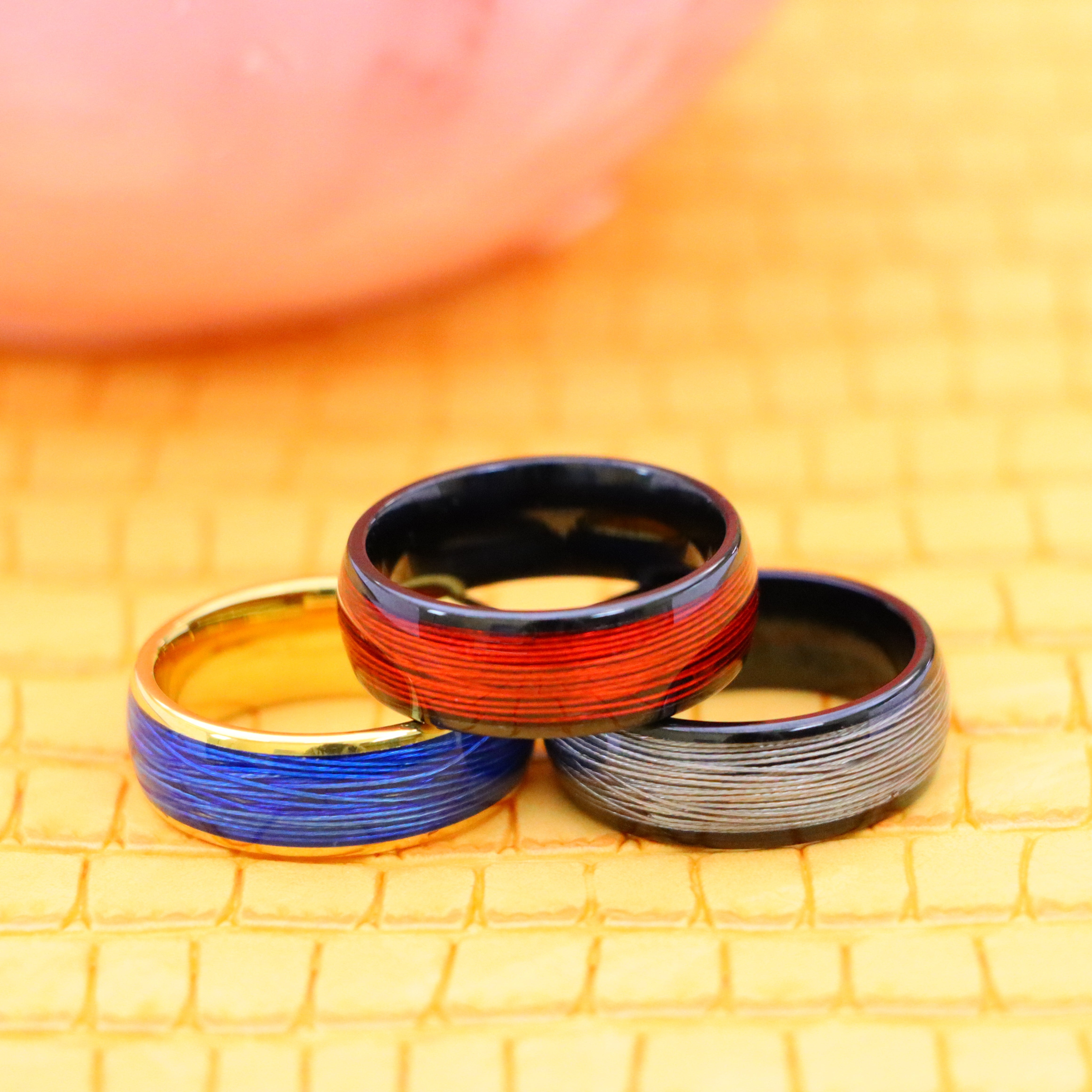 8mm Domed Yellow IP Plated Rolled Blue/White/Red Wire Inlay Tungsten Ring